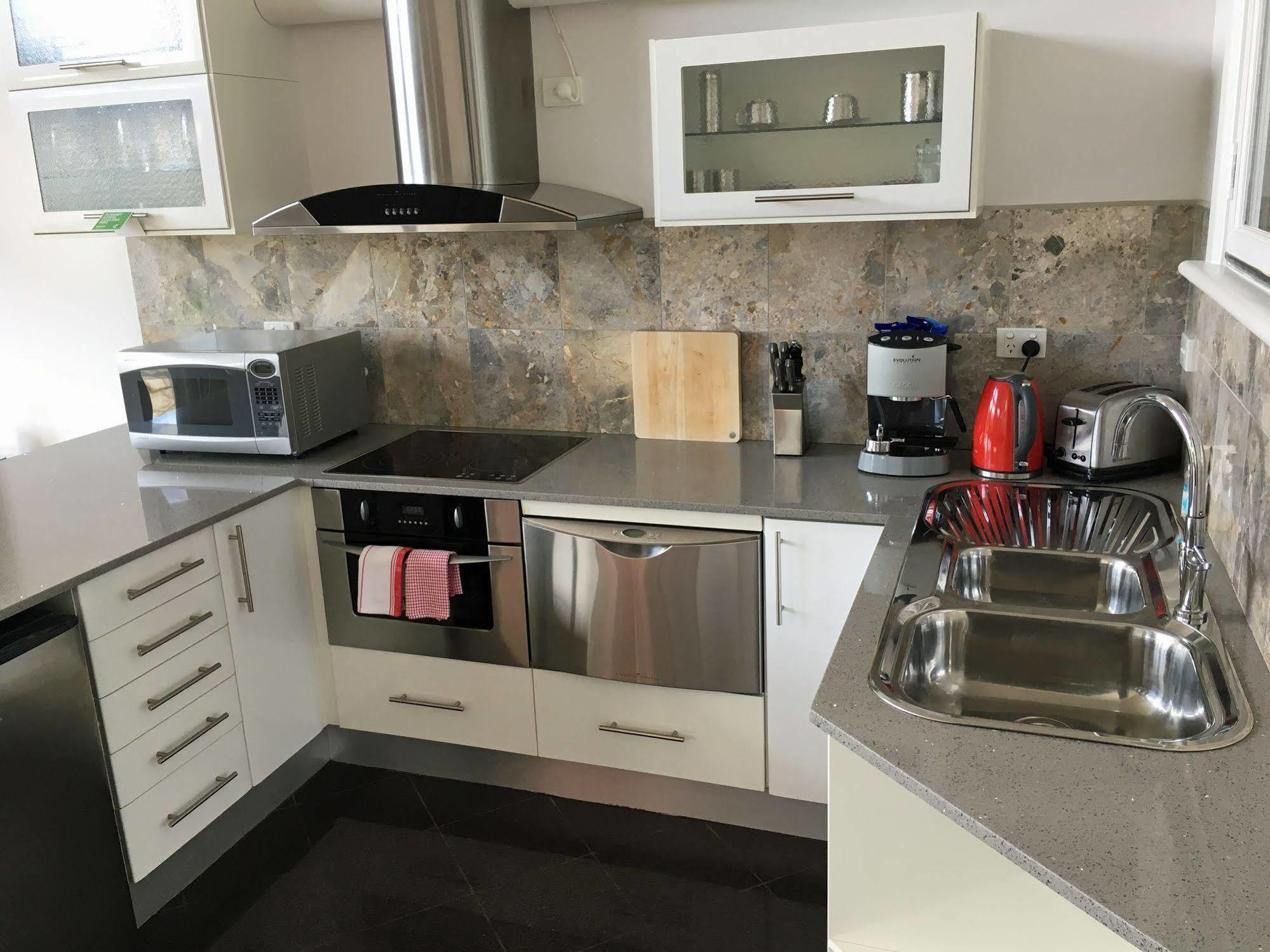 Fully equipped kitchen in the Yarra Suite