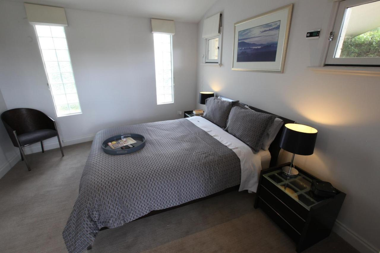 Queen-sized bed in the Yarra Suite